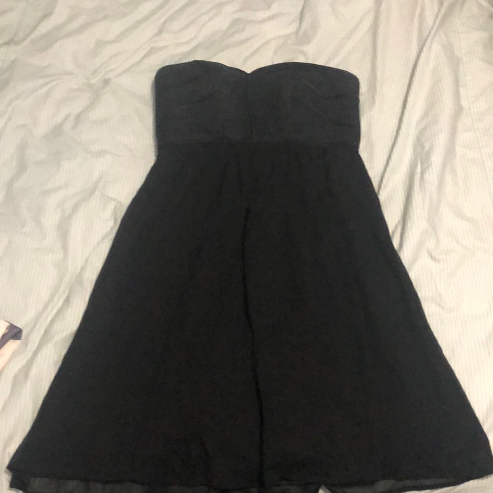 Maxandcleo black cocktail dress.
